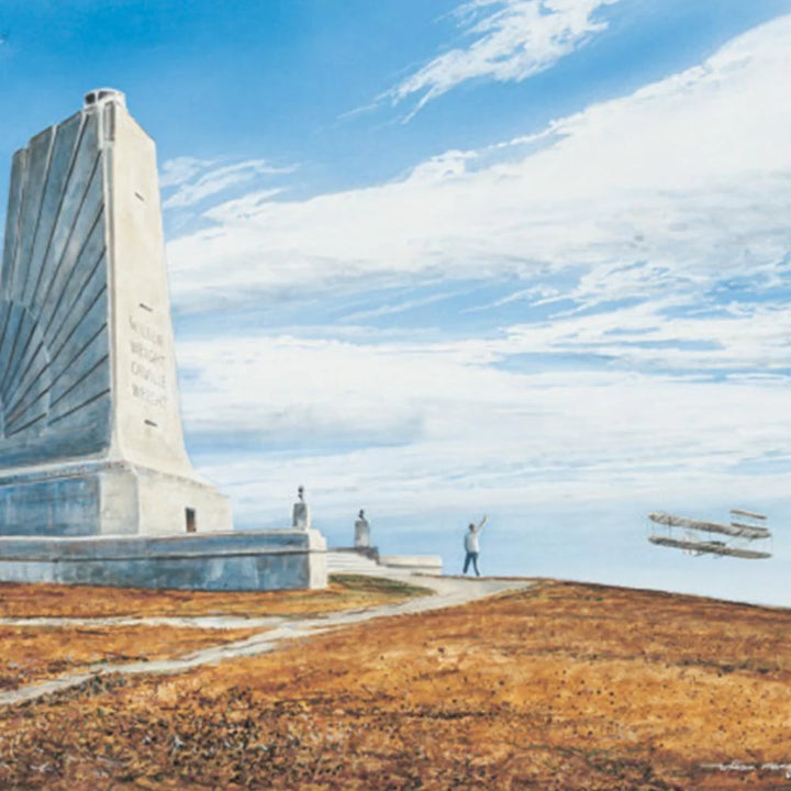 image of the wright brothers memorial in Kill Devil Hills north carolina with plane in background and people in foreground