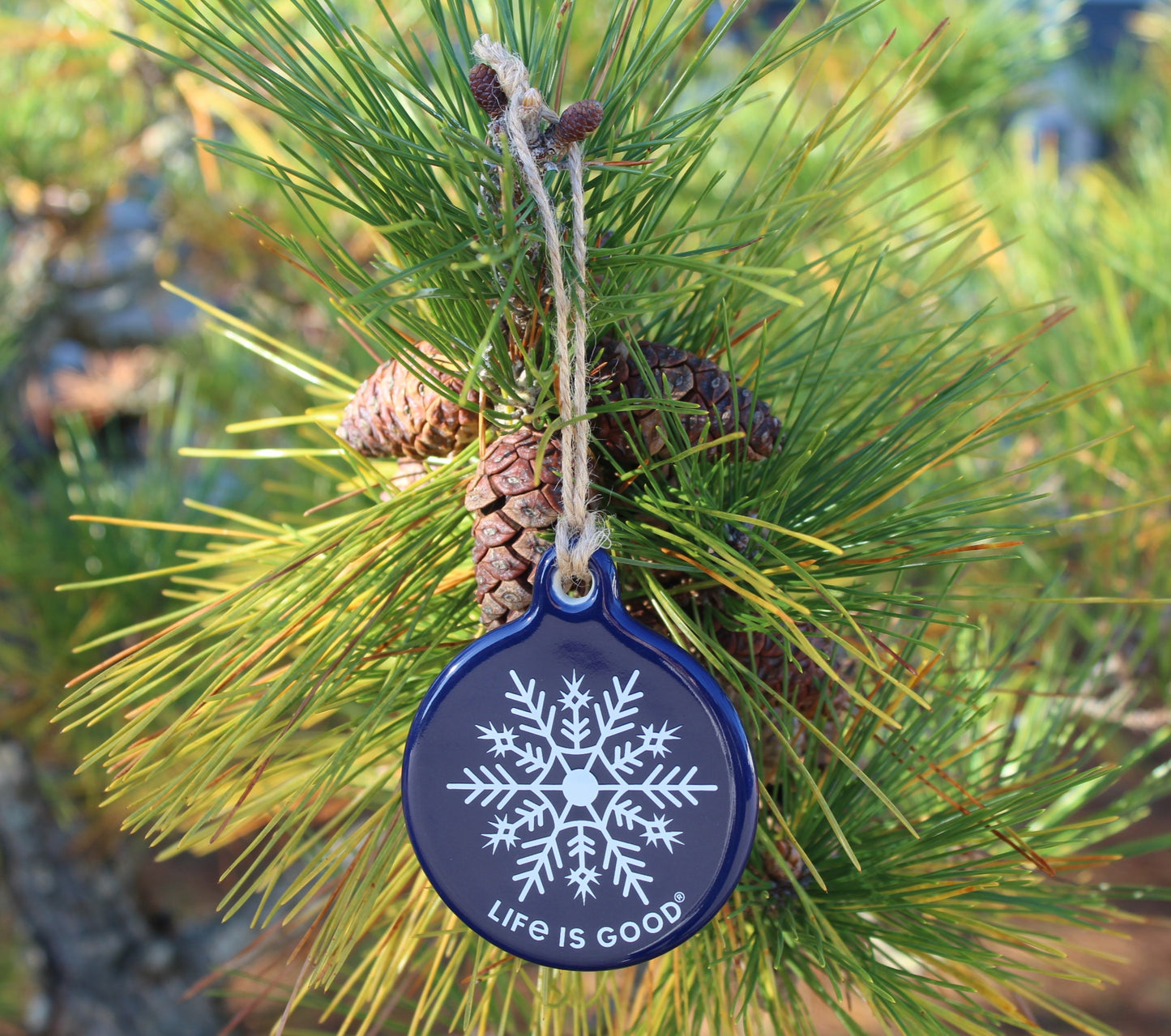 Life is good navy blue snowflake ornament